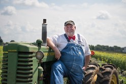 Farmer Lee Jones: Why the Bibs and Bow Tie?” Image